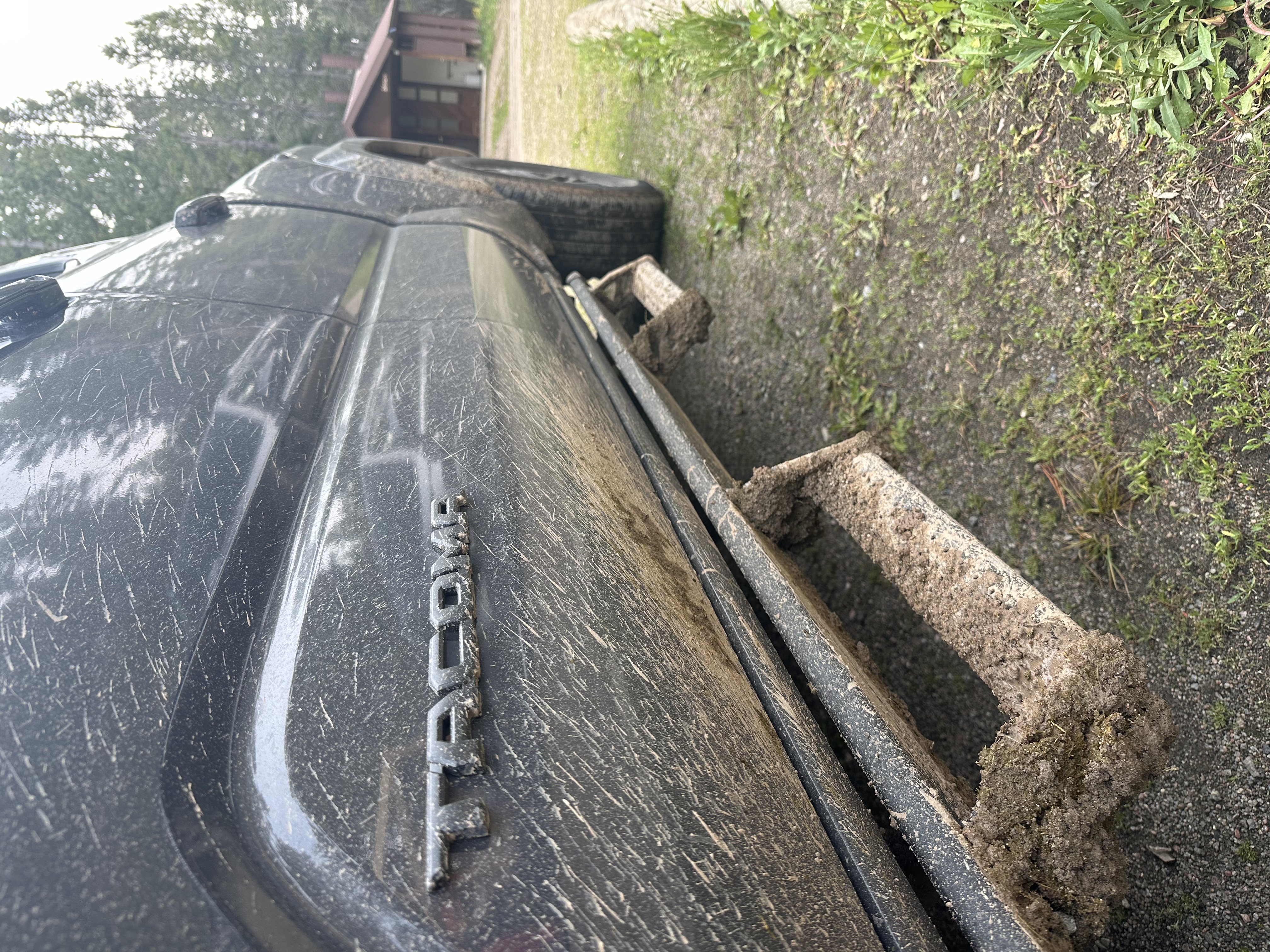 Some fresh mud on the truck after driving to the trailhead